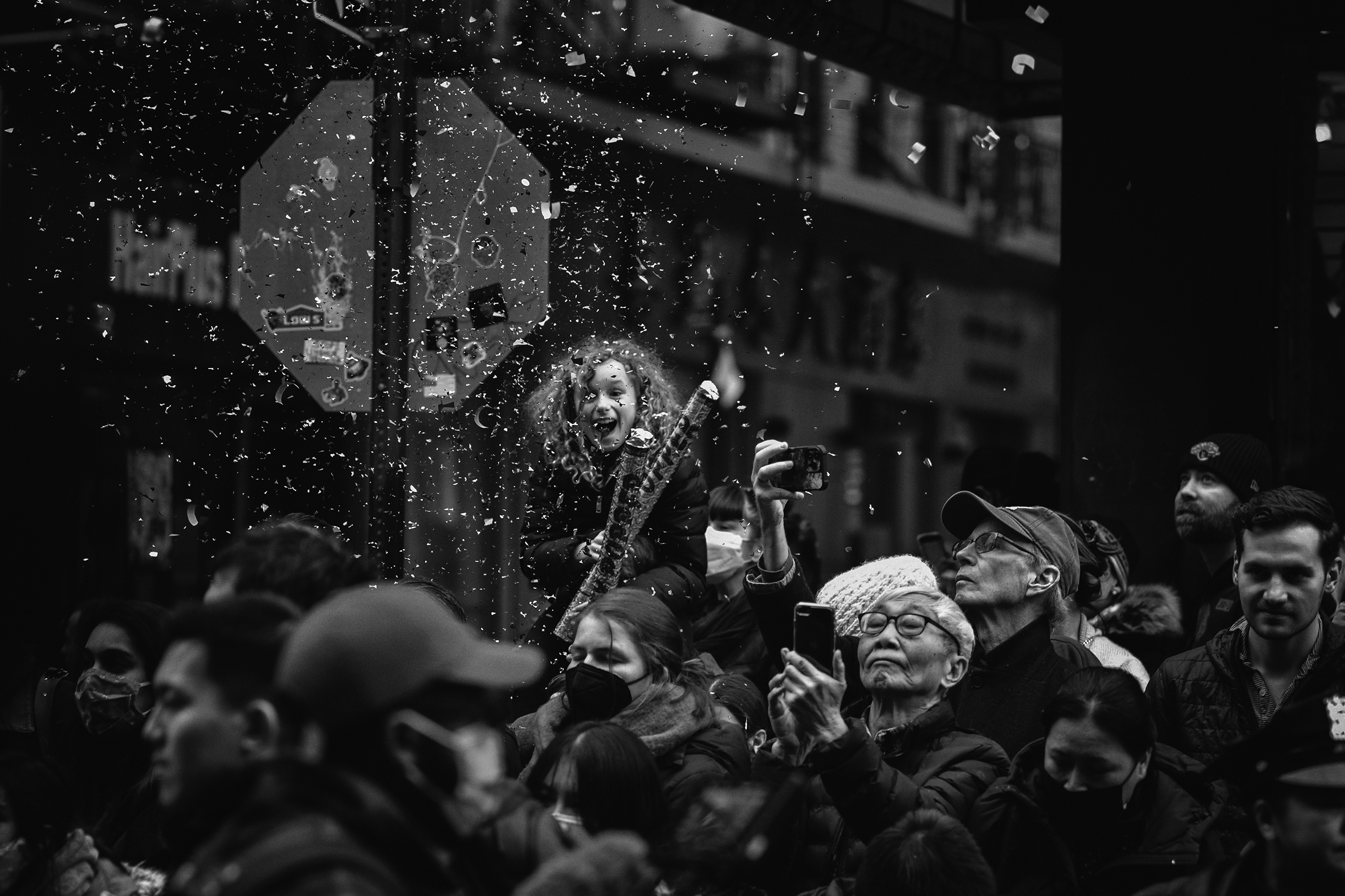 A cheering crowd enjoys the 2023 Lunar New Year Parade in Chinatown in New York City.